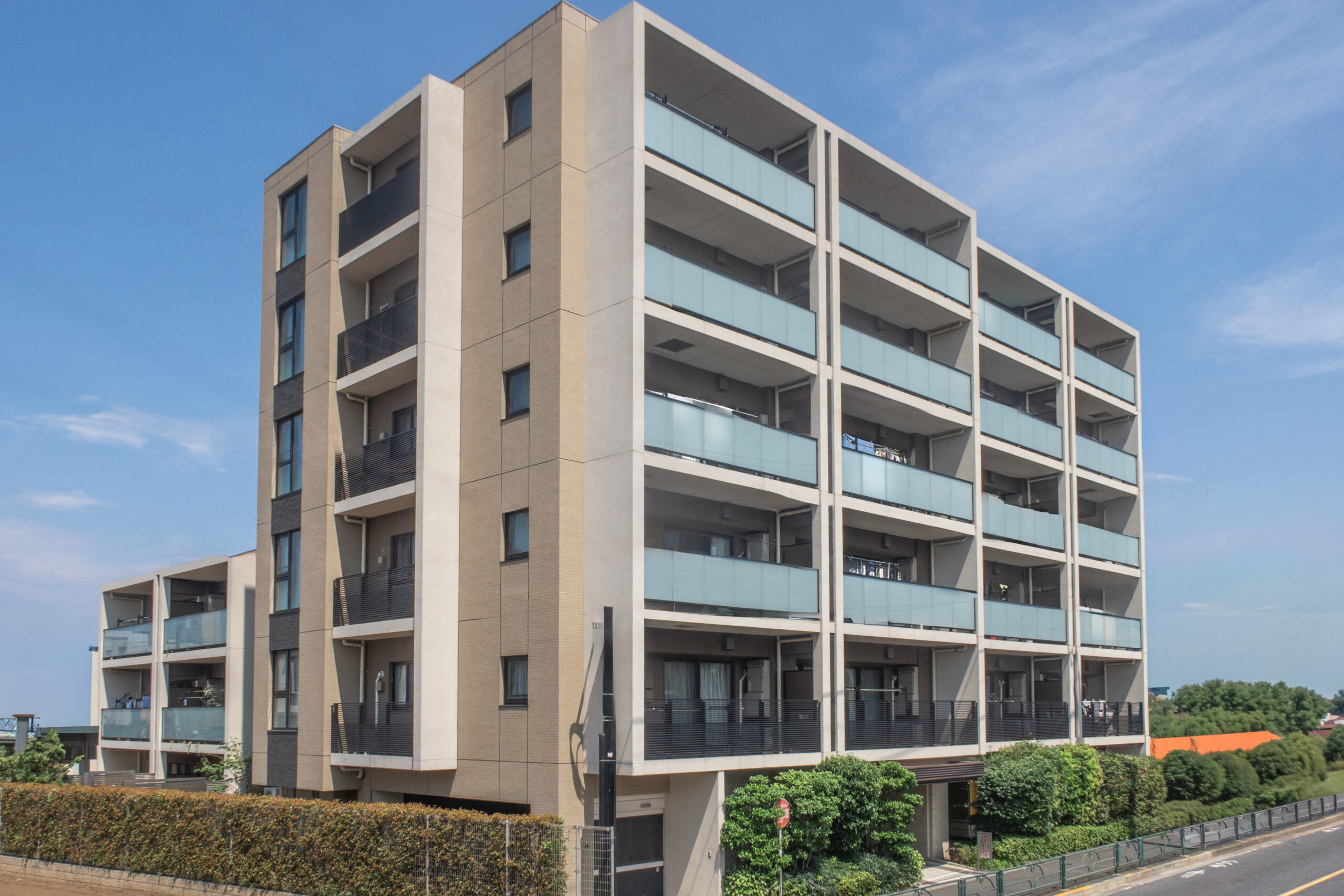 家賃収入の源泉となる賃貸マンションの外観を表現する画像